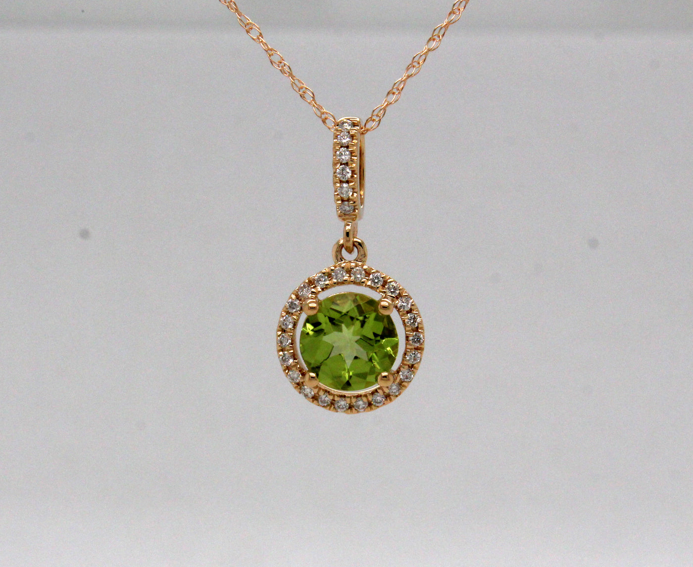 14KY .95 Ct Peridot and .11 Cttw Diamond Pendant