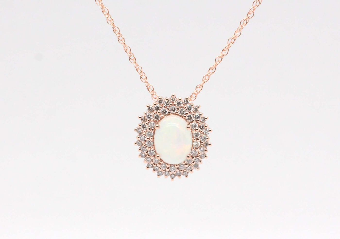 14KR .90 Ct Opal and Diamond Pendant image