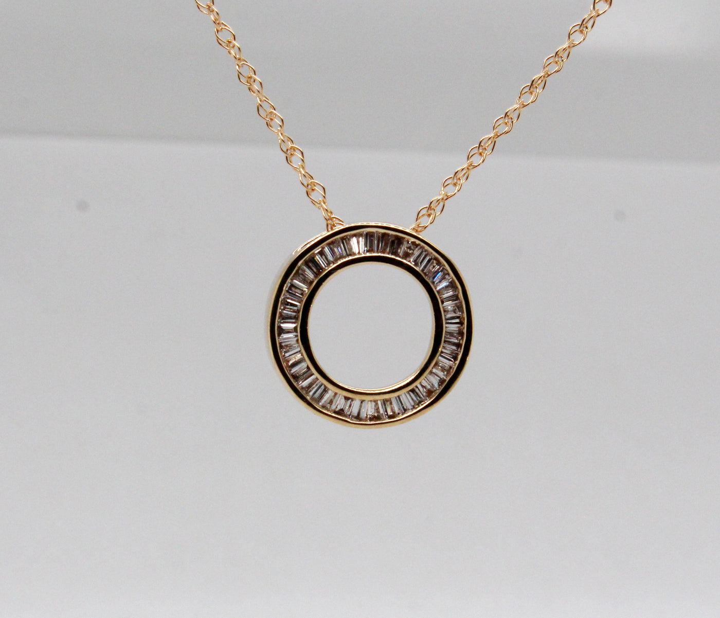 Estate 14KY .50 Cttw Baguette Diamond Circle Pendant