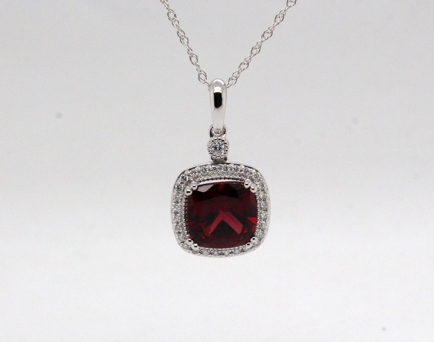 14KW 2.75 Ct Garnet and .18 Cttw Diamond Pendant